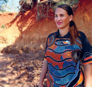 Tammy Wallace stands on country reflecting on cultural humility and the positive effects it can have on healing intergenerational trauma for First Nations People.
